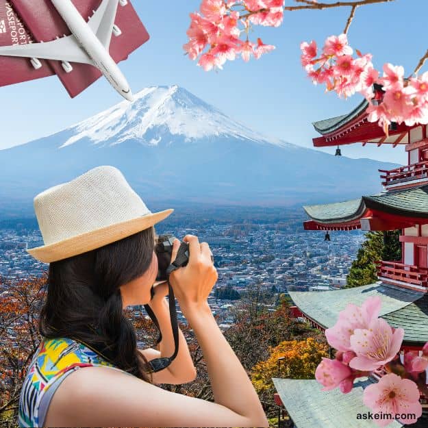 woman taking a photo of mount fuji in japan